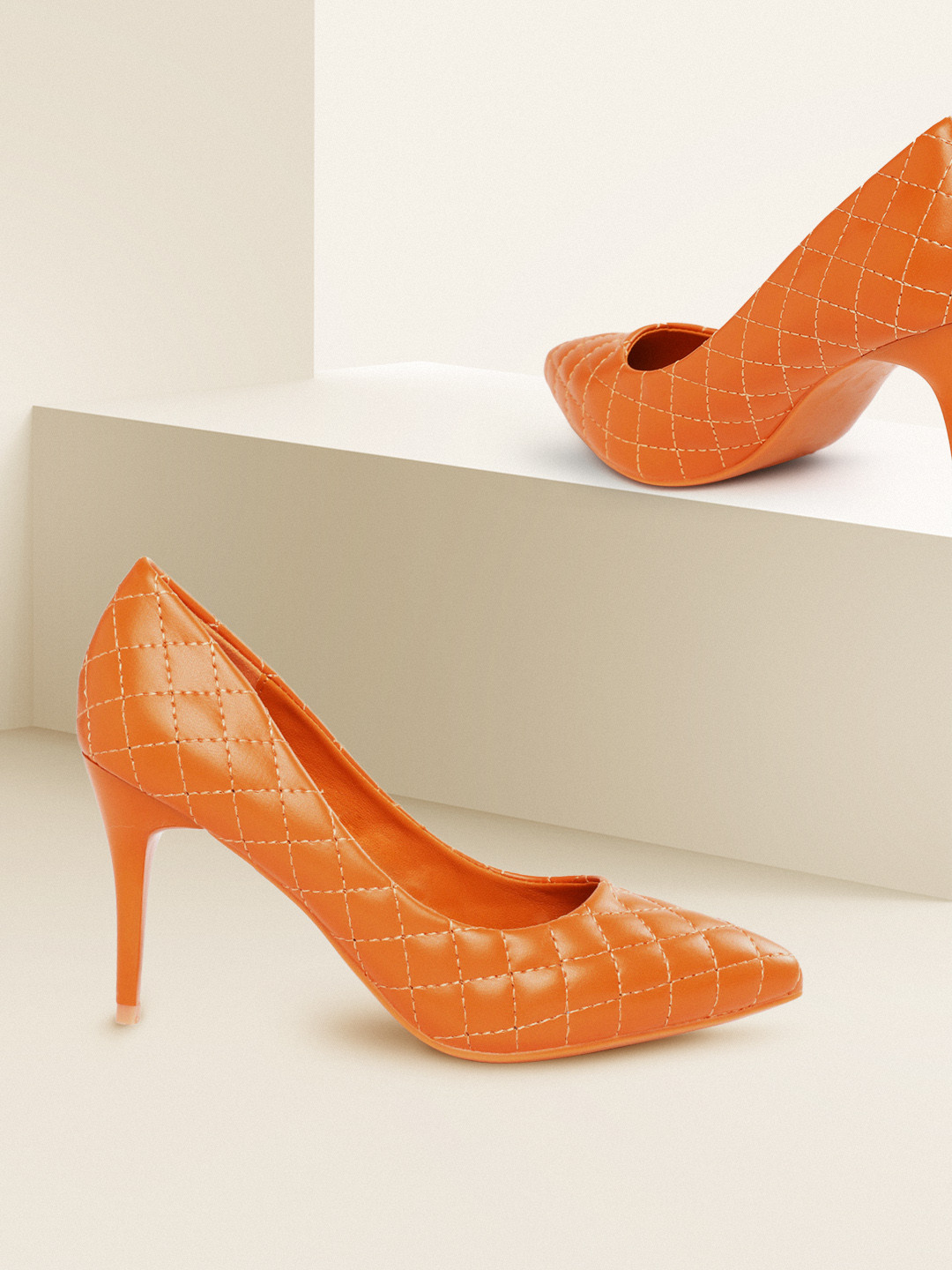 

CORSICA Women Coral Orange Quilted Pumps