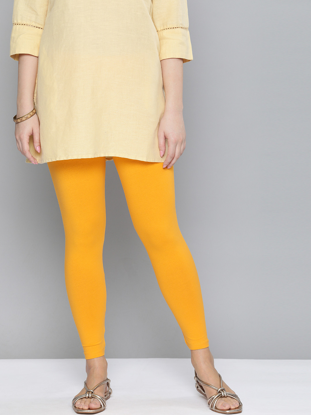 

HERE&NOW Women Yellow Solid Leggings