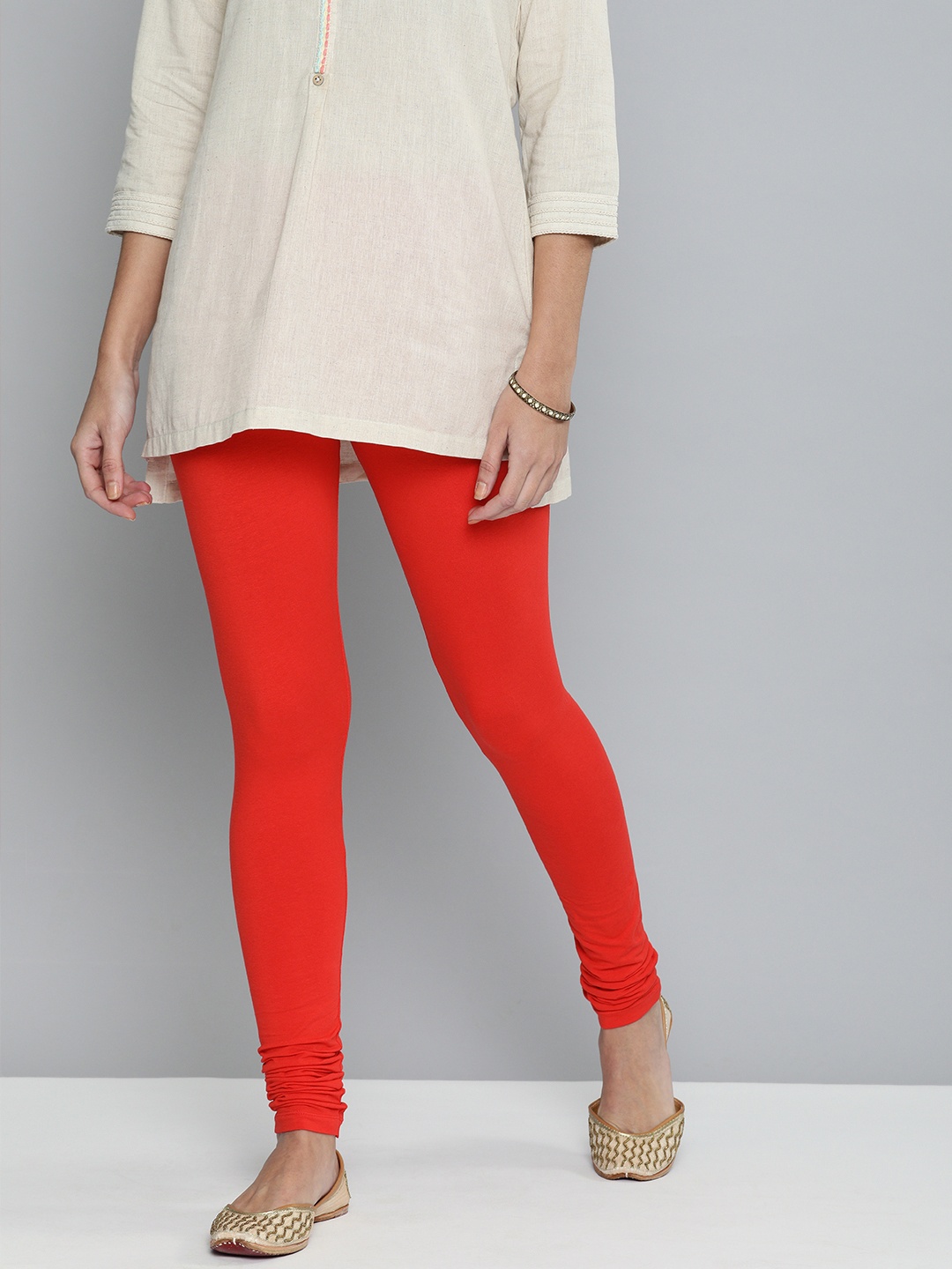 

HERE&NOW Women Red Solid Churidar-Length Leggings