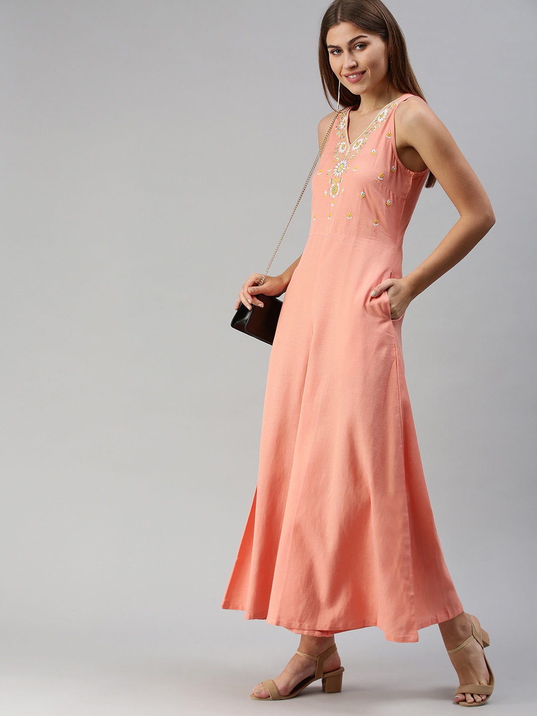 

Global Desi Peach-Coloured & White Embroidered Sleevless V-Neck Basic Jumpsuit