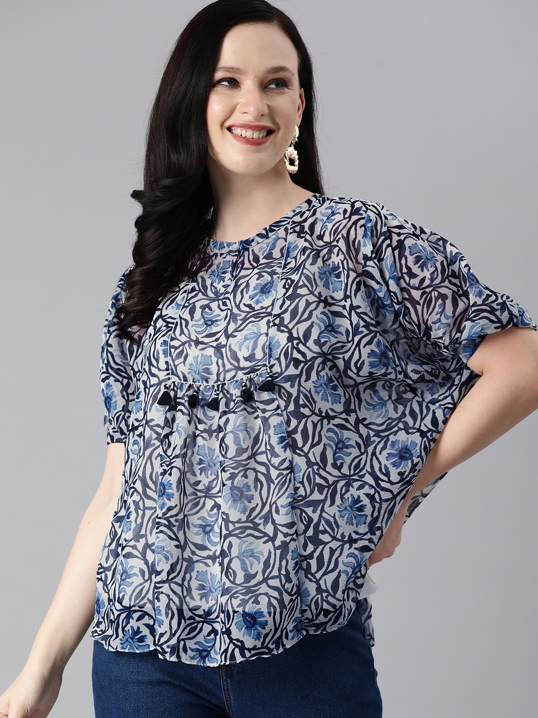 

Global Desi White & Blue Floral Tasseled Batwing Sleeves Styled Back Top
