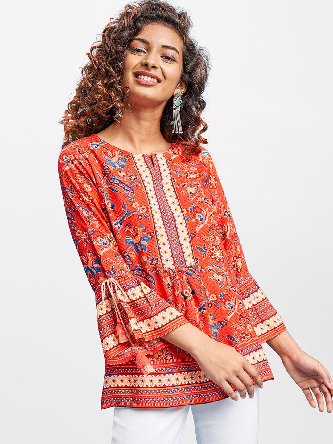 

Global Desi Women Coral & Blue Floral Bell Sleeve Peplum Top