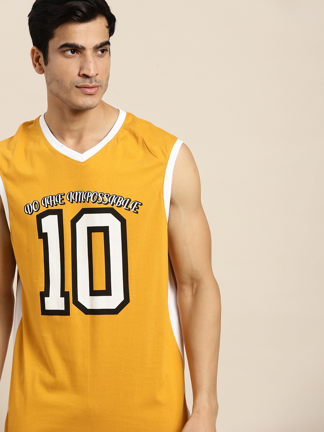 

Moda Rapido Men Mustard Yellow White Varsity Print Pure Cotton V-Neck Pure Cotton T-shirt