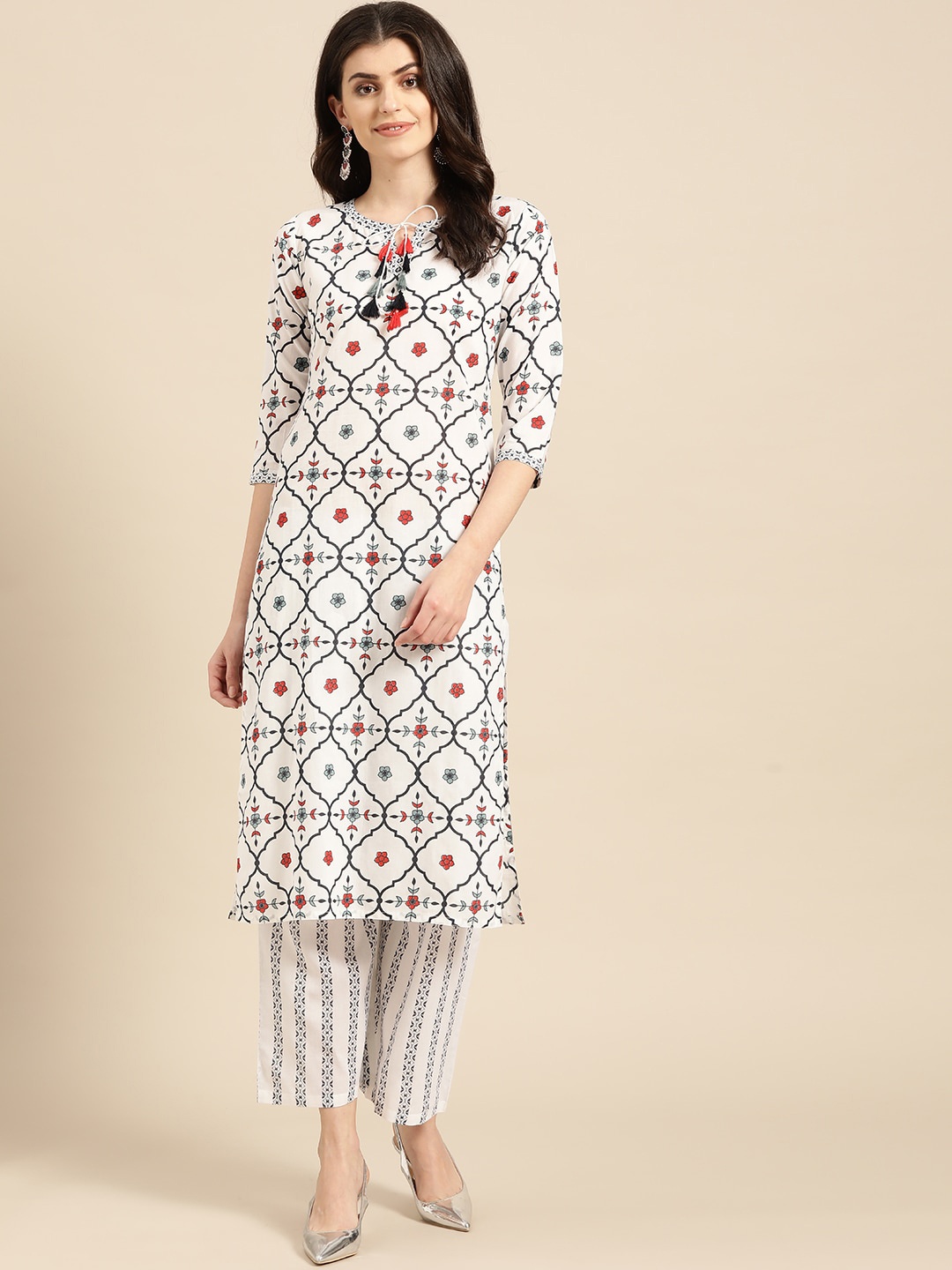 

Varanga Women White & Black Ethnic Motifs Printed Regular A-Line Kurta & Trousers