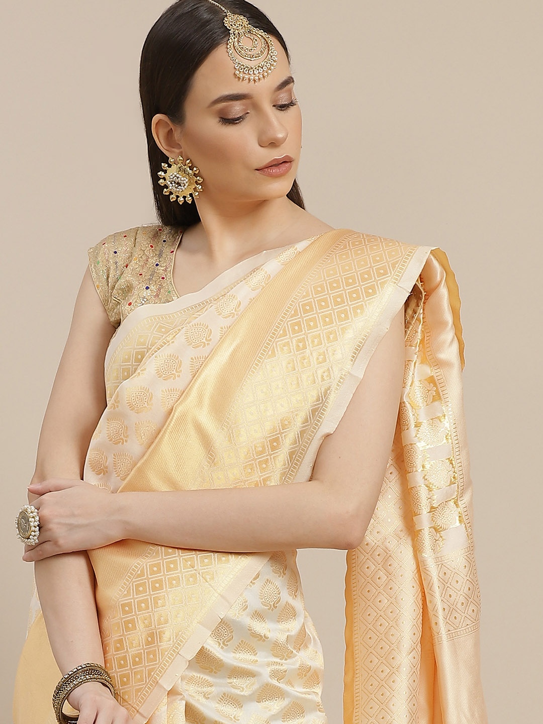 

Anouk Off White & Golden Ethnic Motifs Woven Design Banarasi Saree
