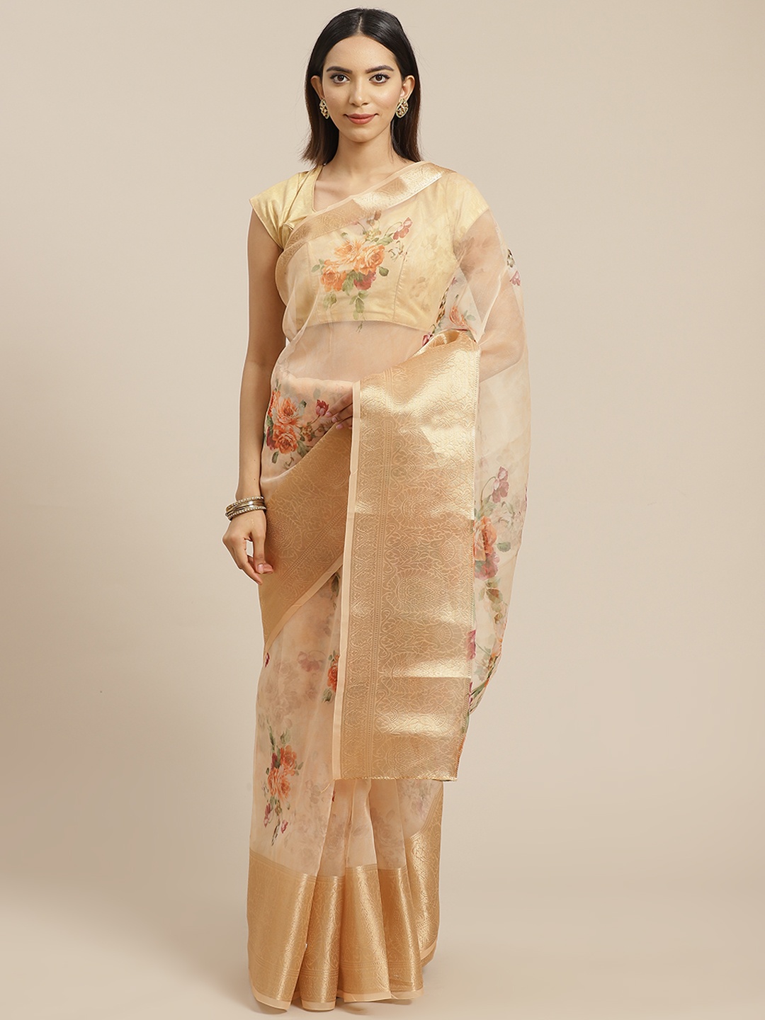 

Anouk Cream Colored & Orange Floral Print Organza Saree