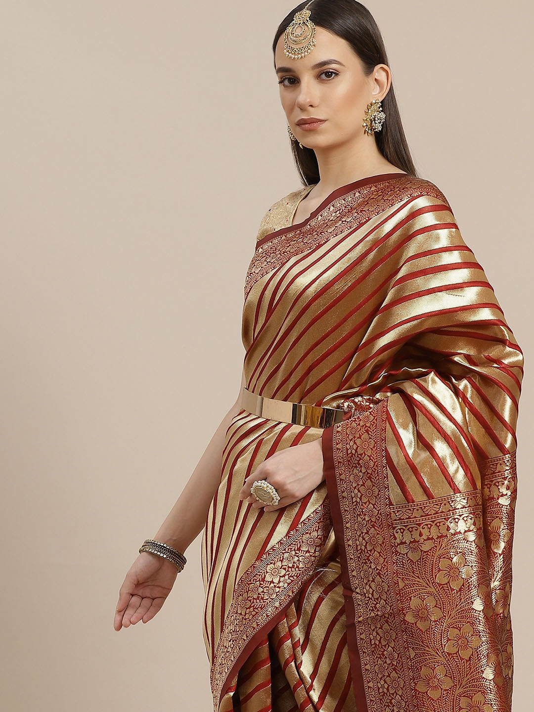 

Anouk Maroon & Golden Striped Art Silk Banarasi Saree