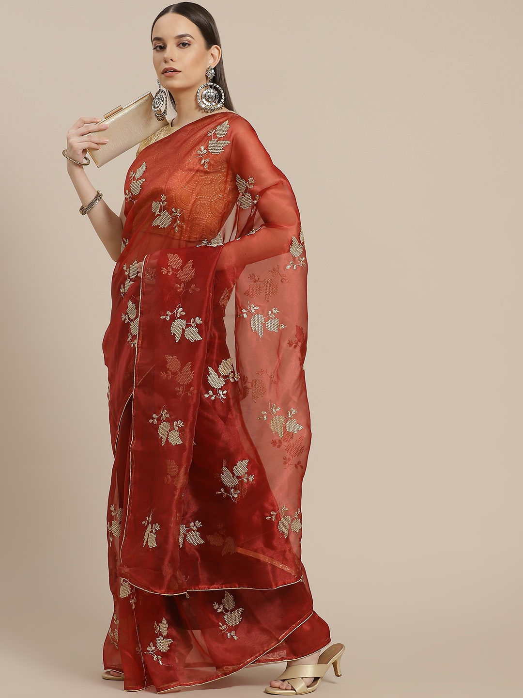 

Anouk Rust Orange & Beige Ethnic Motifs Embellished Organza Saree
