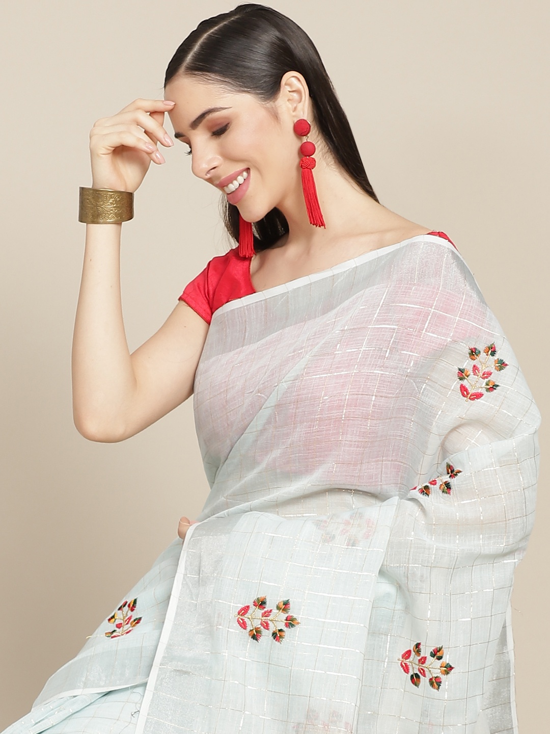

Anouk Sea Green & Red Ethnic Motifs Zari Linen Blend Saree