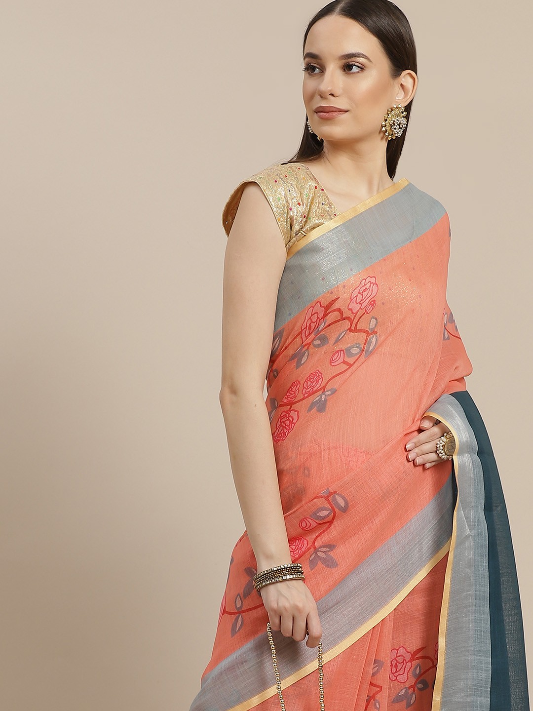 

Anouk Peach Coloured & Blue Floral Printed Linen Blend Saree