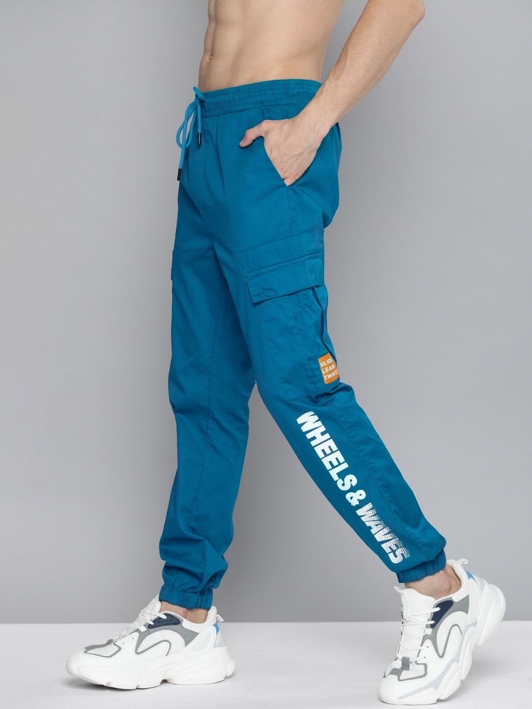 

HERE&NOW Men Teal Blue Printed Joggers