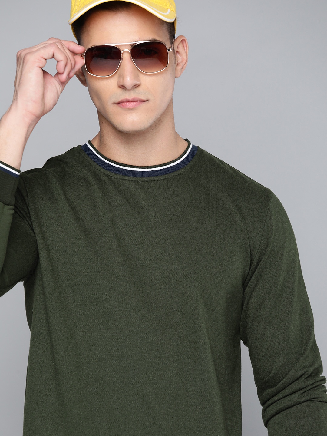 

Harvard Men Olive Green Solid Sweatshirt