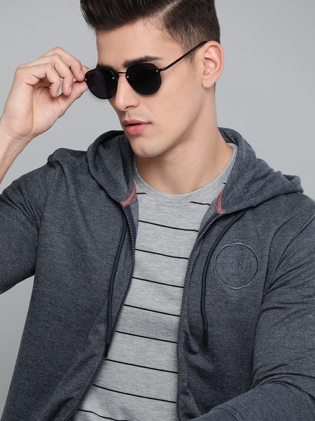 

Harvard Men Navy Blue Melange Solid Hooded Sweatshirt
