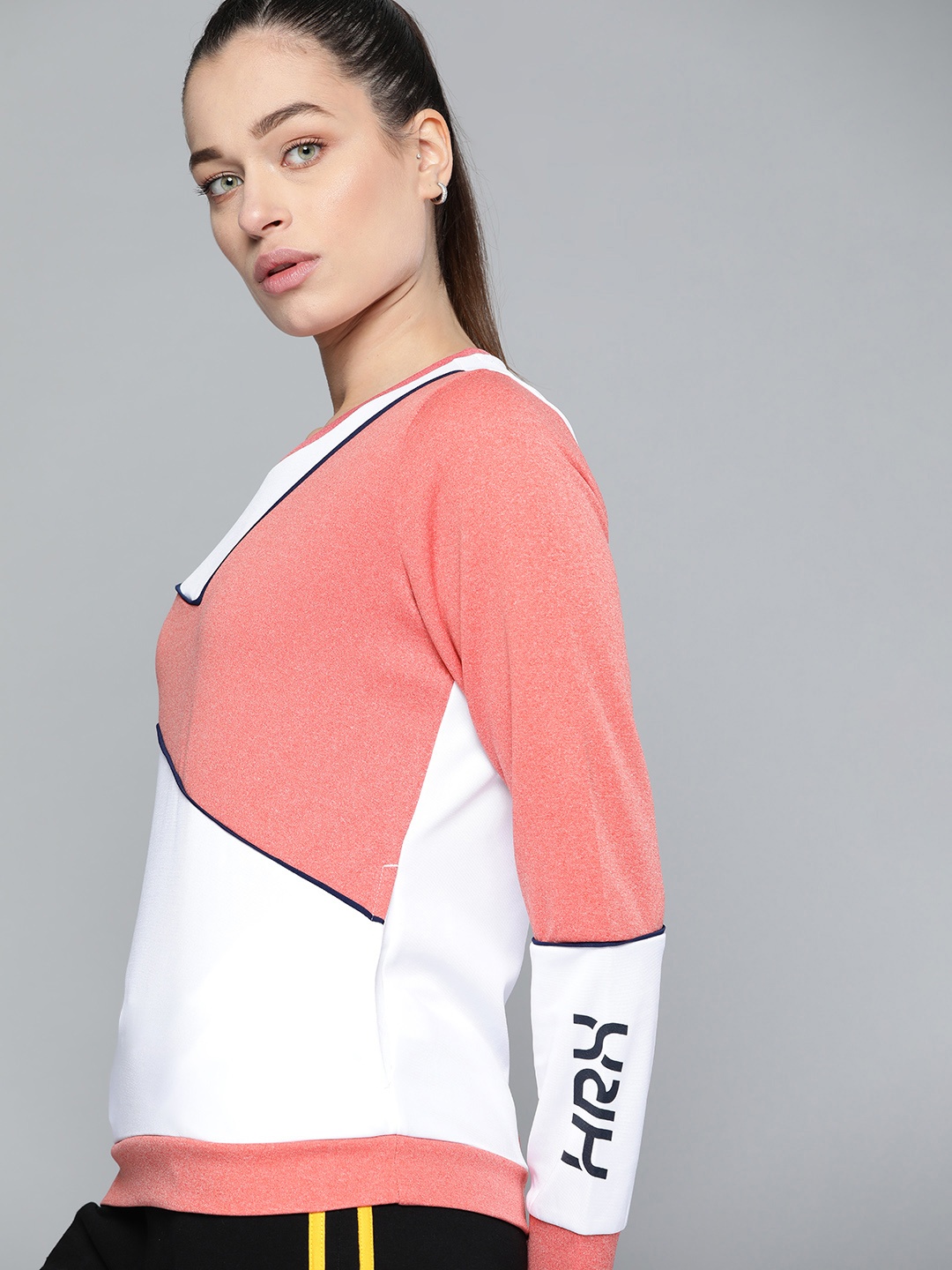 

HRX By Hrithik Roshan Lifestyle Women High Risk Red Rapid-Dry Colourblock Sweatshirt, Peach