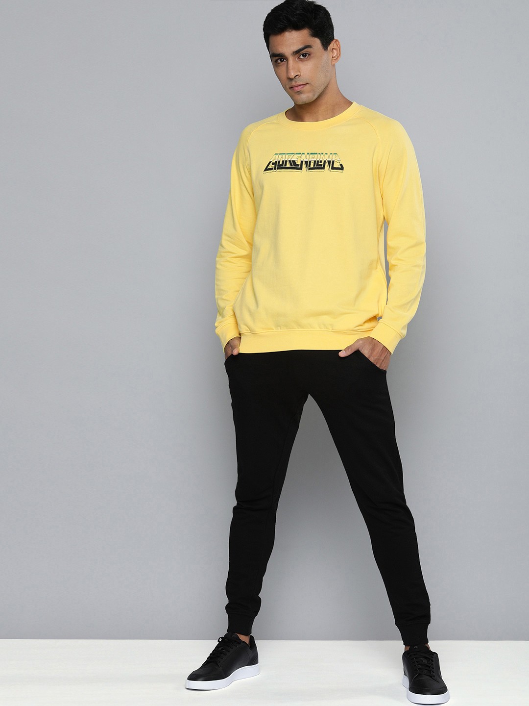 

HRX by Hrithik Roshan Men Yellow Printed Sweatshirt