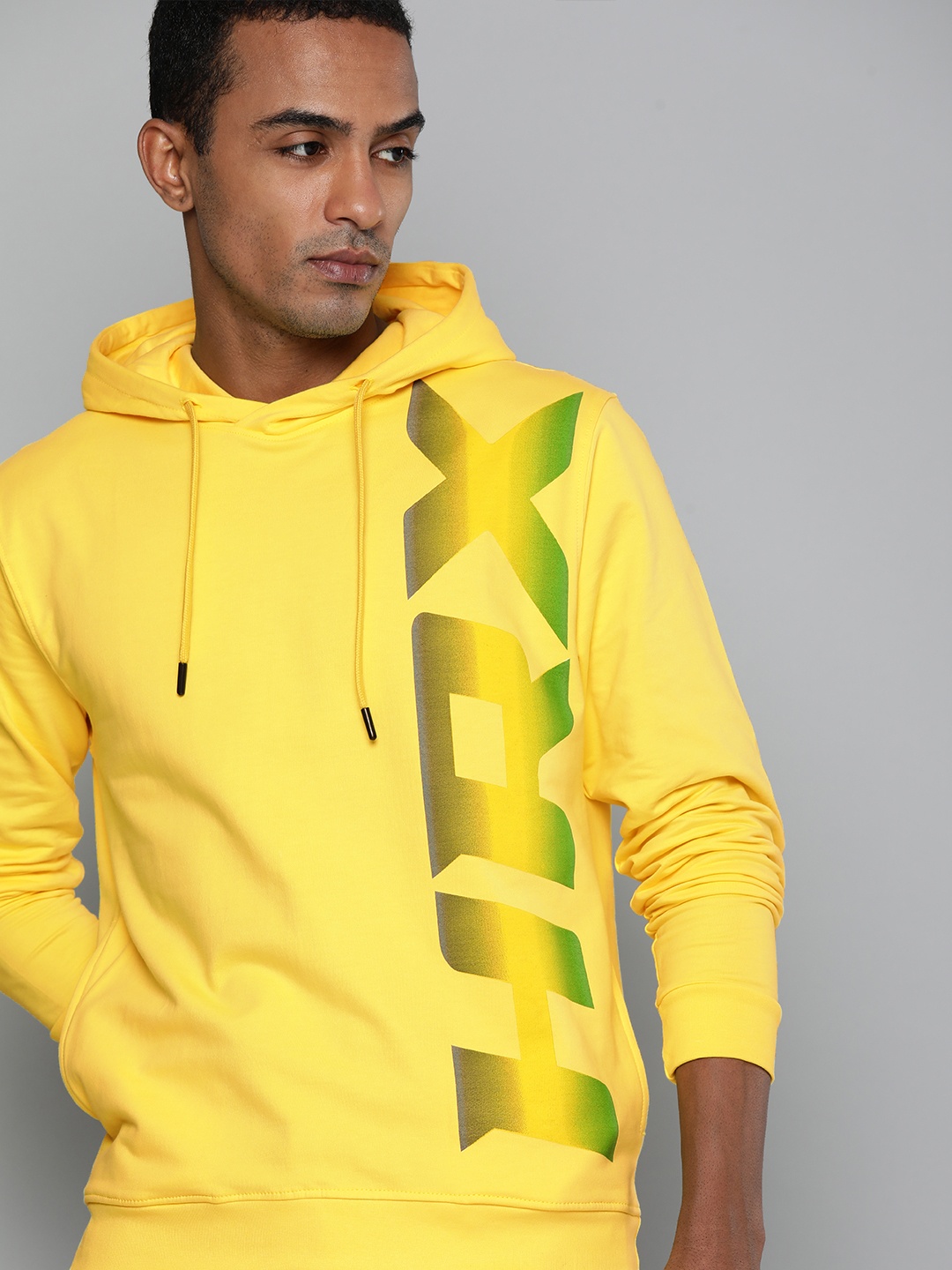 

HRX By Hrithik Roshan Lifestyle Men lemon Drop Bio-Wash Brand Carrier Sweatshirts, Yellow