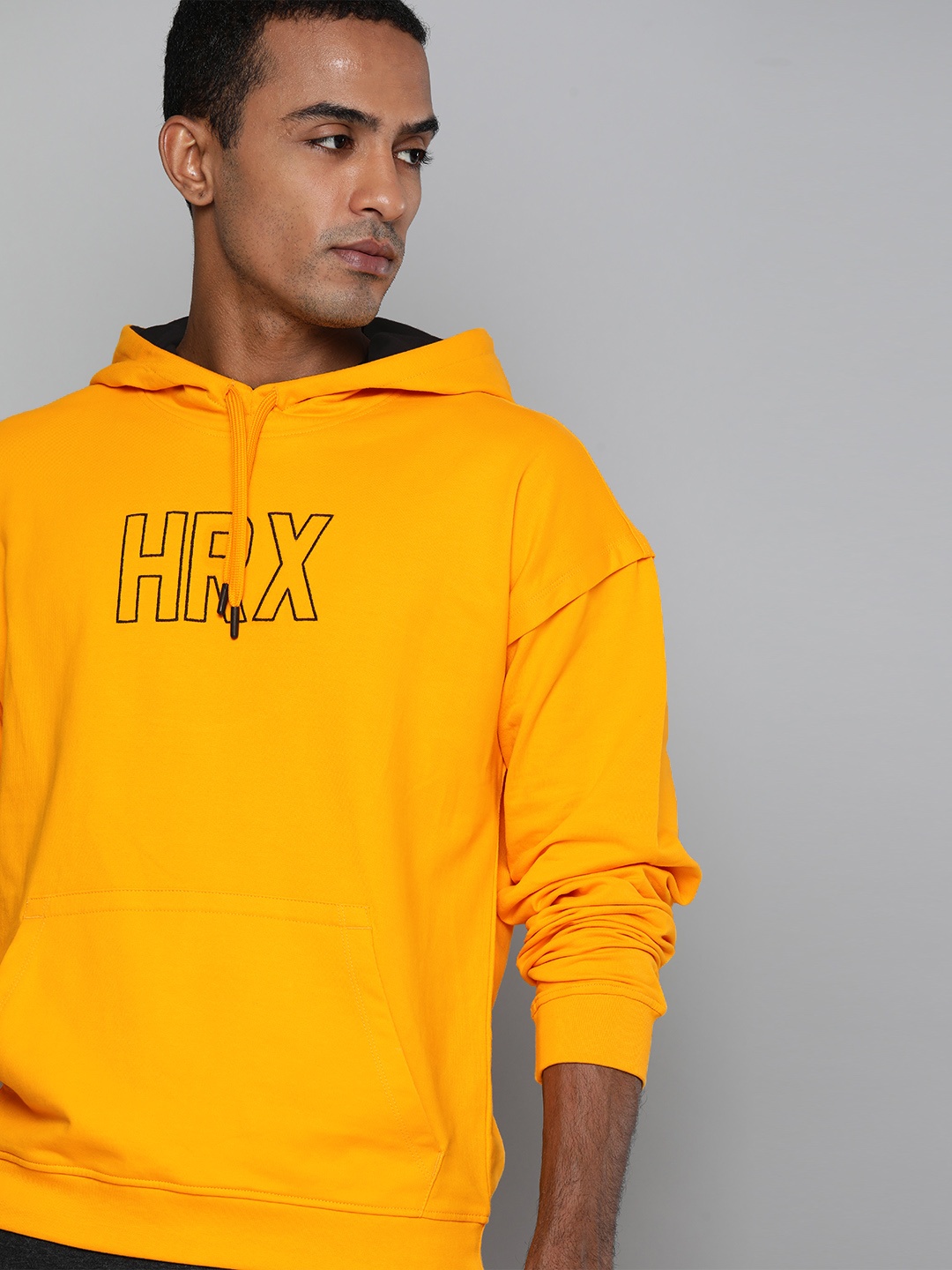 

HRX By Hrithik Roshan Lifestyle Men Electric Kumquat & Jet Black Bio-Wash Sweatshirts, Mustard