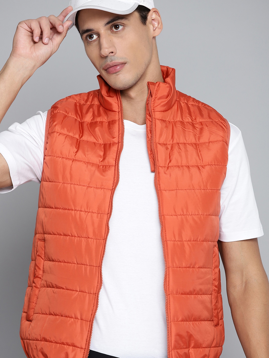 

HRX By Hrithik Roshan Outdoor Men Burnished sunset Packable Solid Jacket, Orange