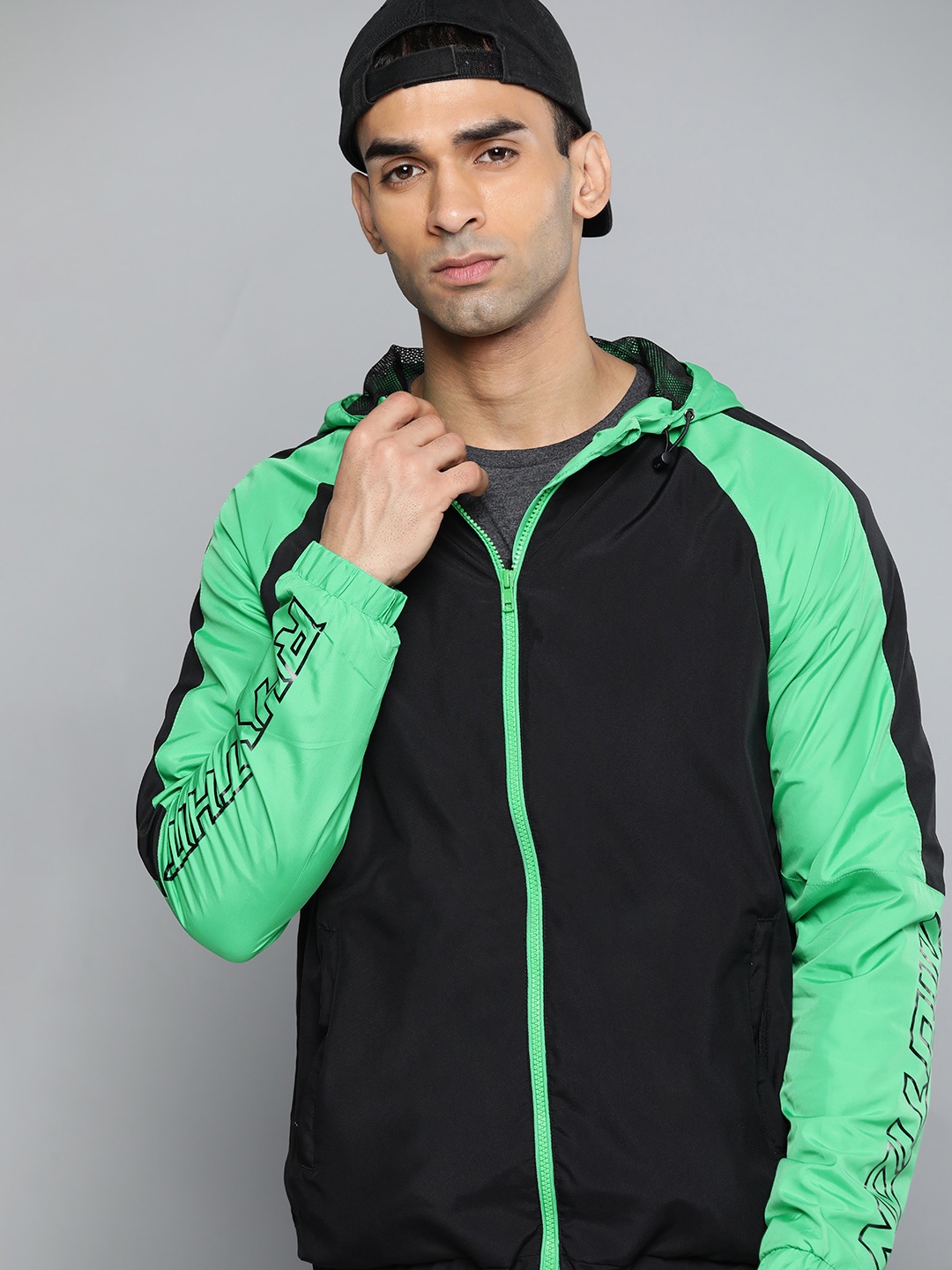 

HRX By Hrithik Roshan Lifestyle Men Jet Black & kelly green Rapid-Dry Sporty Jacket