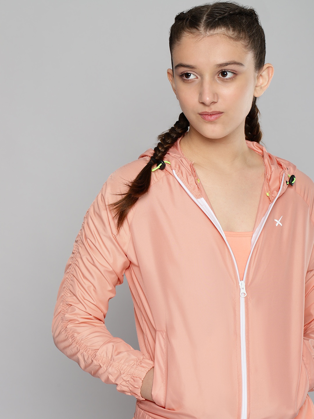 

HRX By Hrithik Roshan U-17 Active Girls Peach Amber Rapid-Dry Solid Jacket