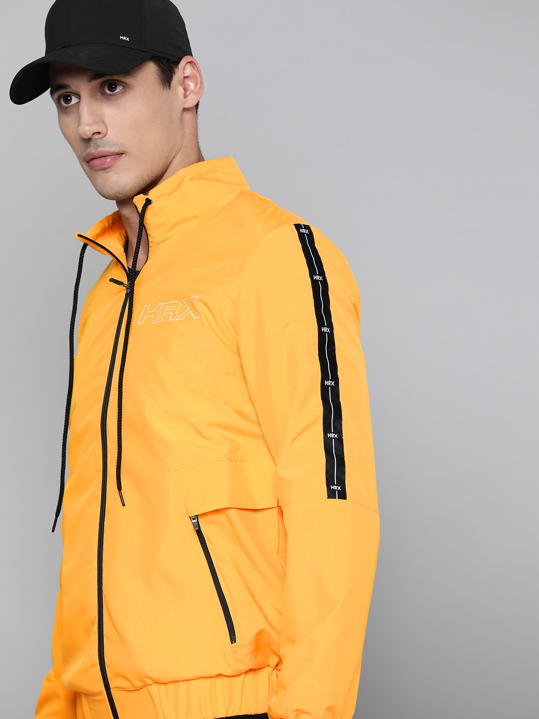 

HRX By Hrithik Roshan Lifestyle Men Electric Kumquat Rapid-Dry Solid Jacket, Yellow