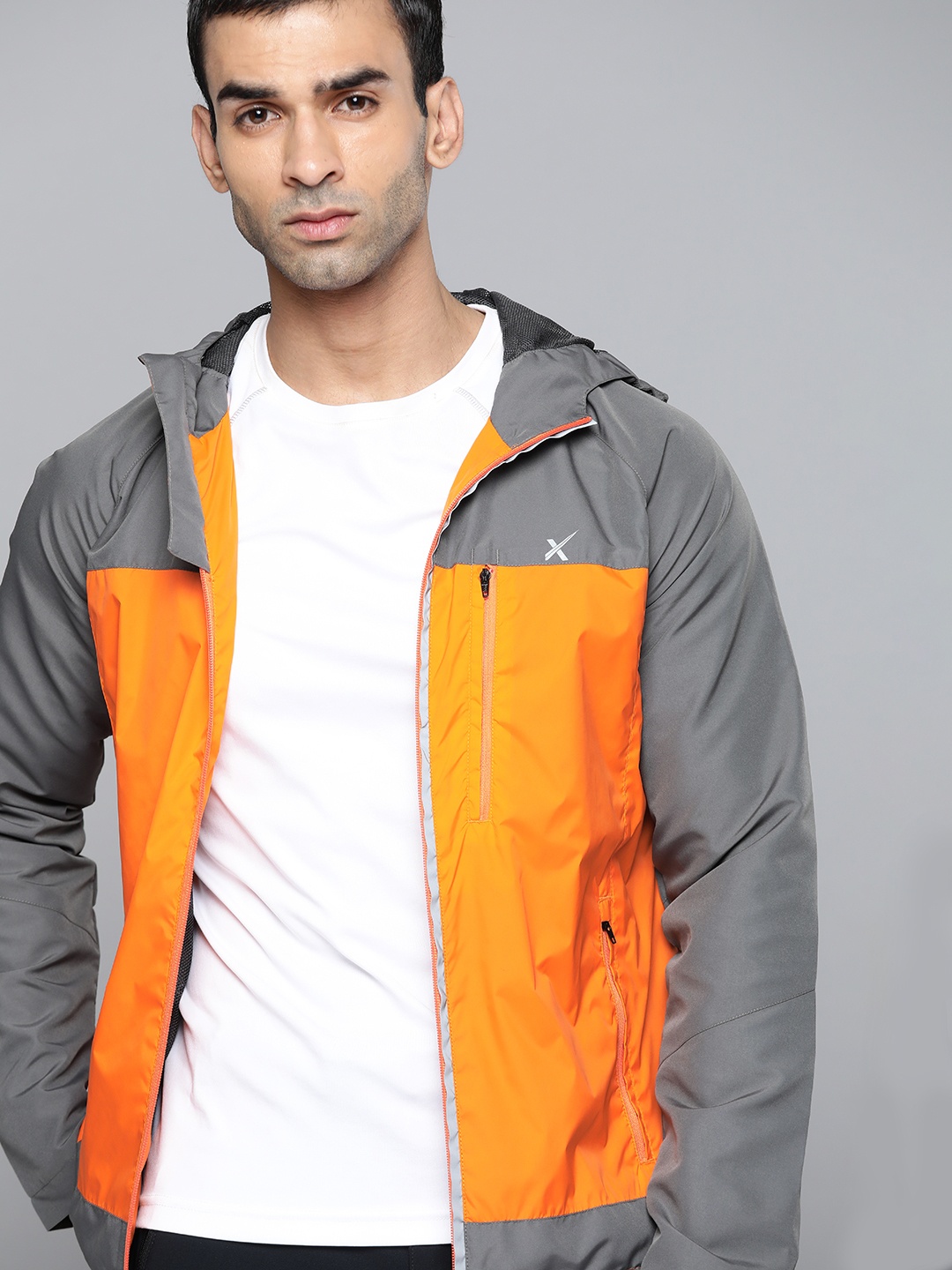 

HRX By Hrithik Roshan Men Outdoor Wet Weather Rapid-Dry Solid Jackets, Orange