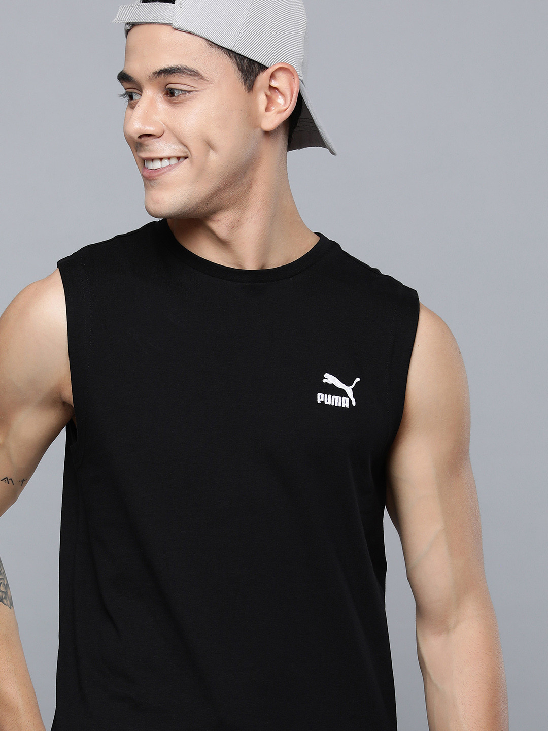 

Puma Men Black & White Brand Logo Classics SL Embro Tee Printed T-shirt
