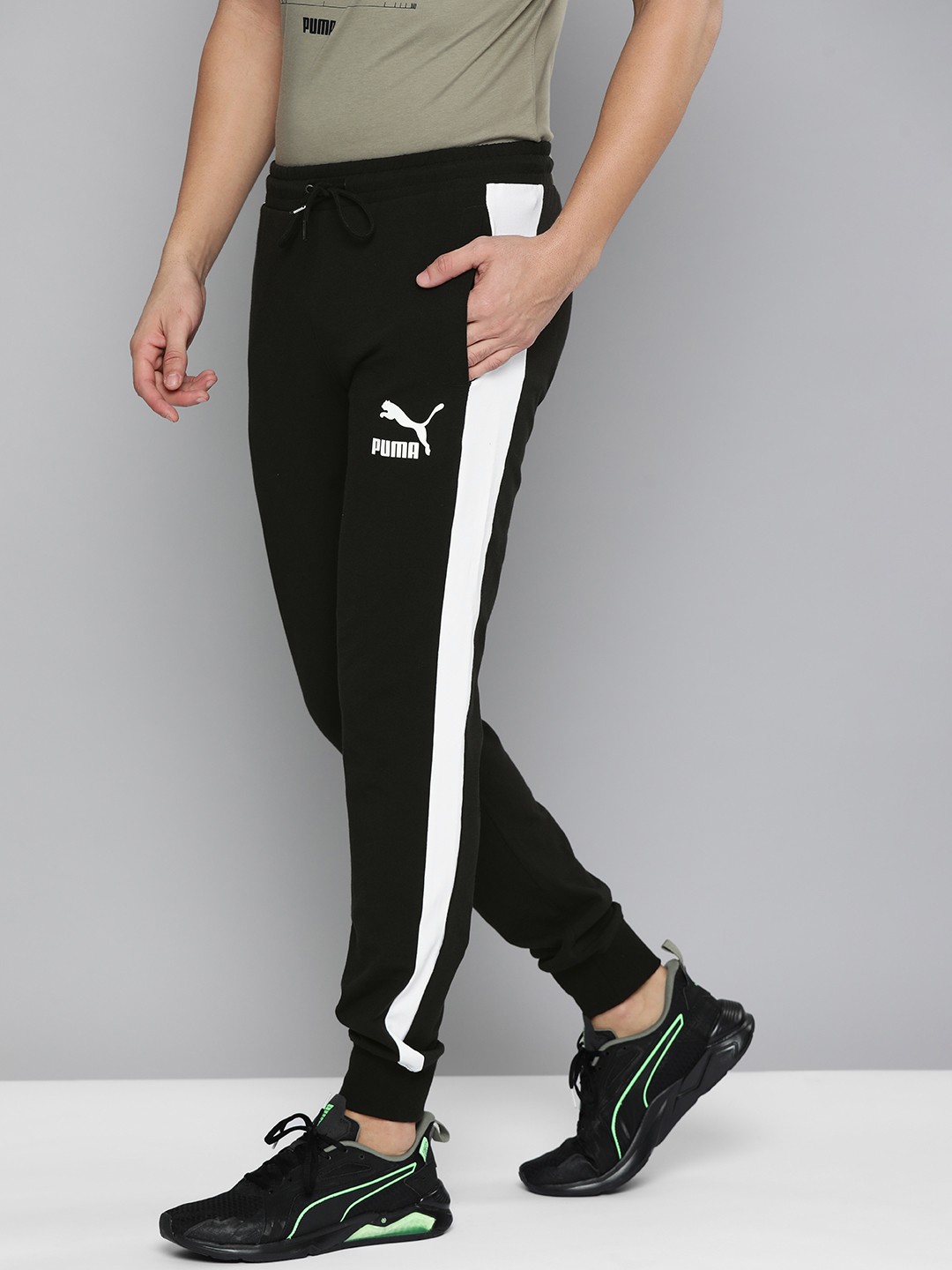 

Puma Men Black Solid Iconic Side Striped Joggers