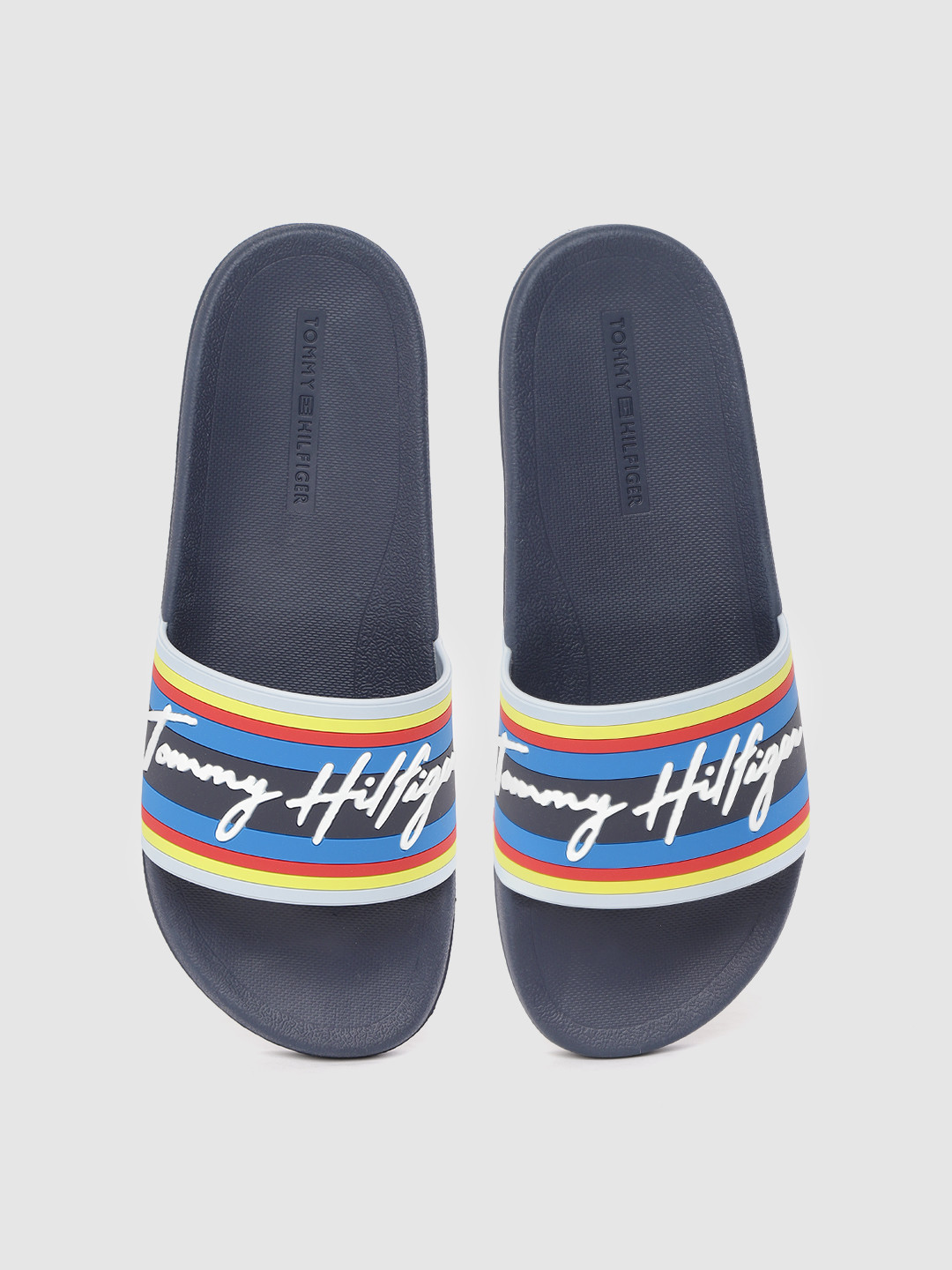 

Tommy Hilfiger Men Blue & White Striped Sliders with Brand Logo Embossed Detail