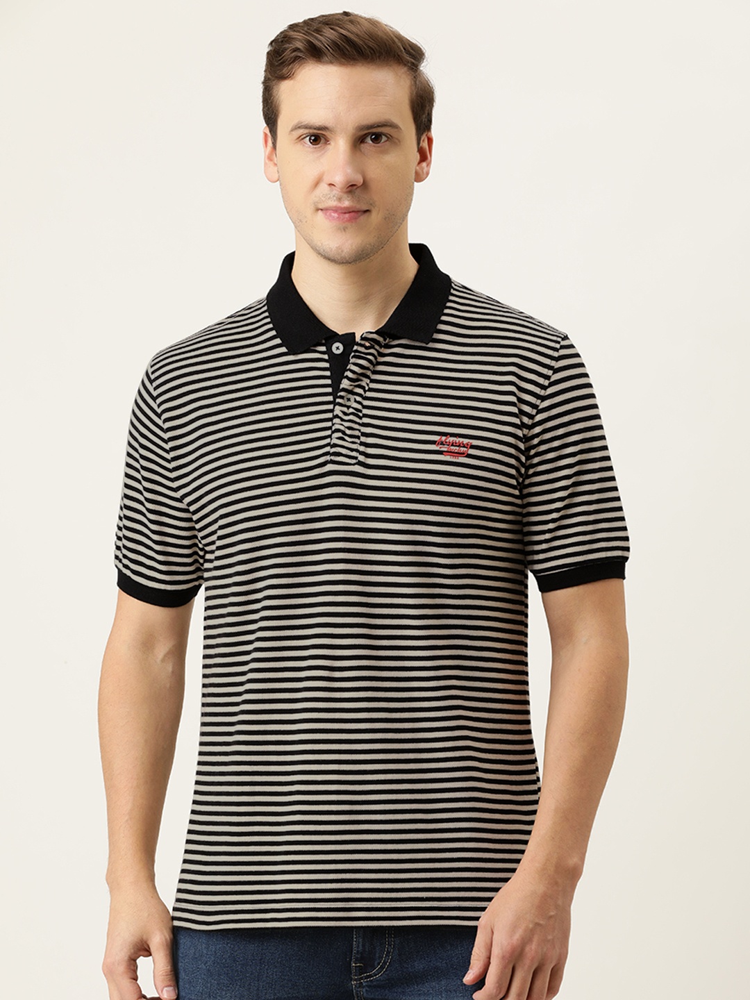 

Flying Machine Men Black White Striped Polo Collar Pure Cotton T-shirt