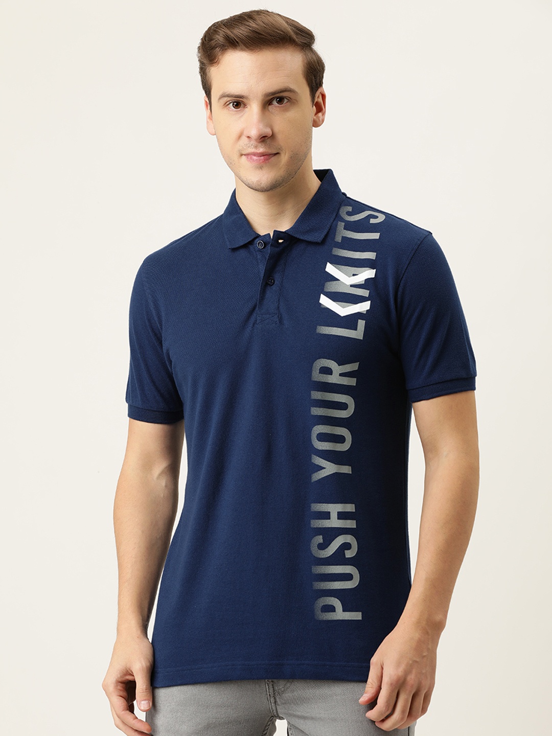 

Flying Machine Men Navy Blue Typography Placement Printed Polo Collar Pure Cotton T-shirt