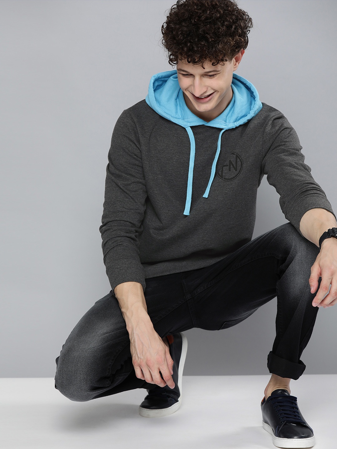 

HERE&NOW Men Charcoal Grey & Blue Solid Hooded Sweatshirt