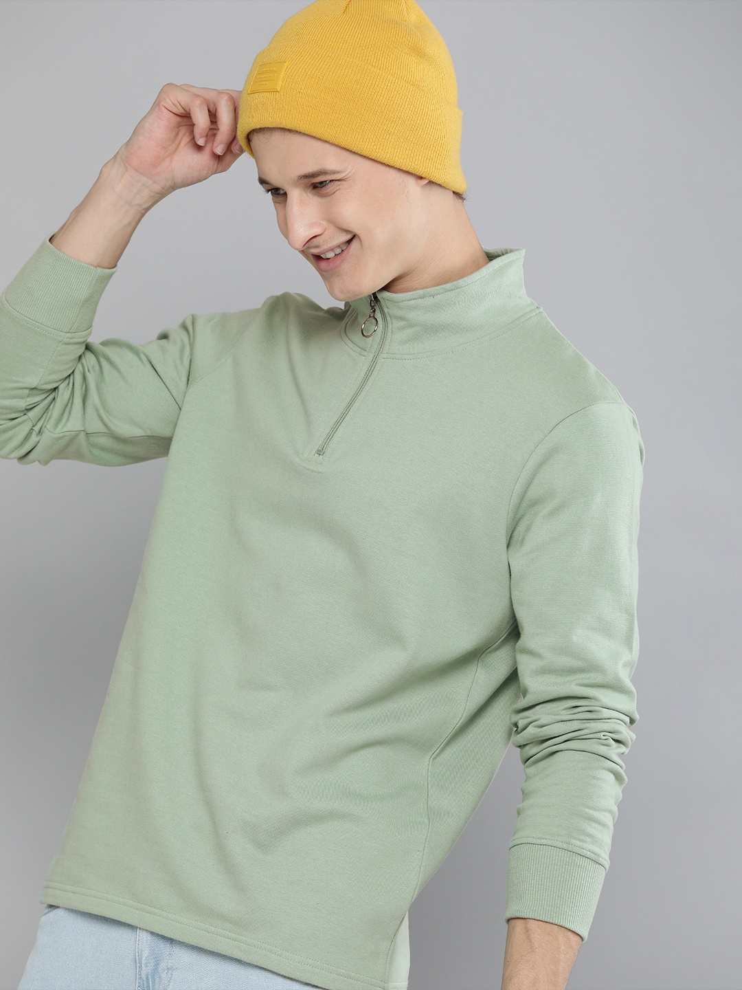 

HERE&NOW Men Green Solid Sweatshirt