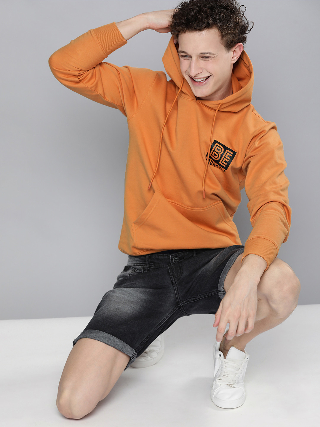 

HERE&NOW Men Orange Printed Hooded Sweatshirt