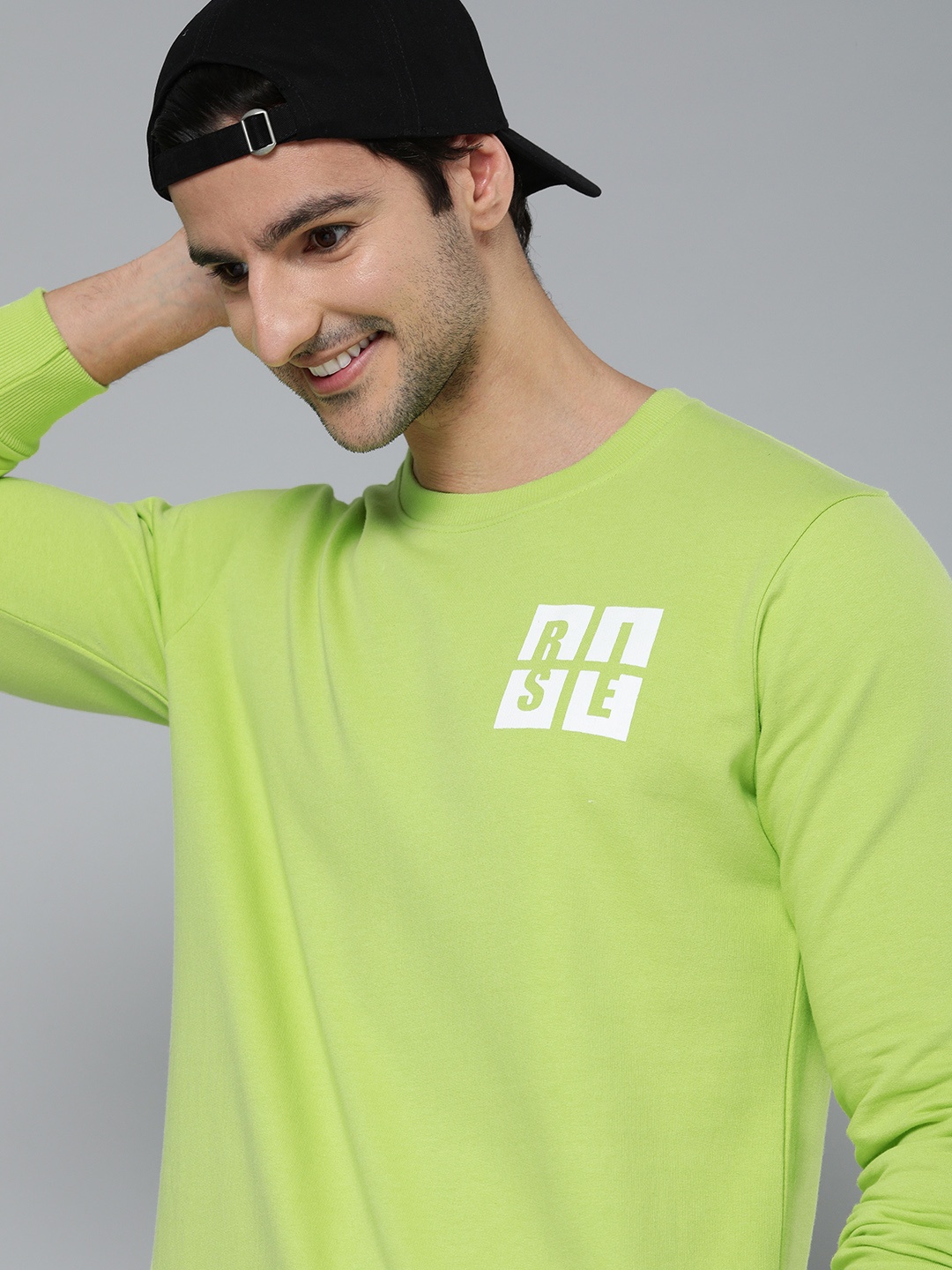 

HERE&NOW Men Green Solid Sweatshirt