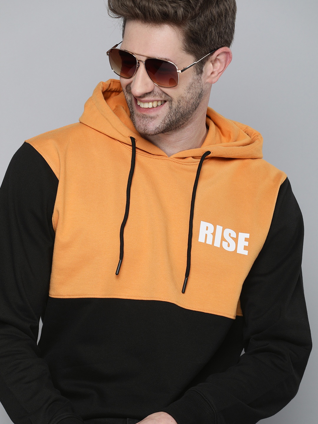 

HERE&NOW Men Orange & Black Colourblocked Hooded Sweatshirt
