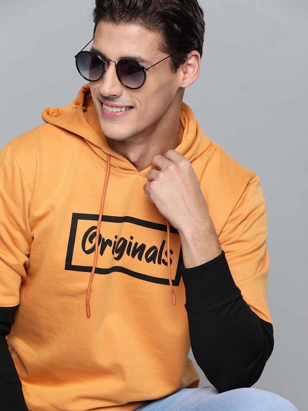 

HERE&NOW Men Orange & Black Printed Hooded Sweatshirt