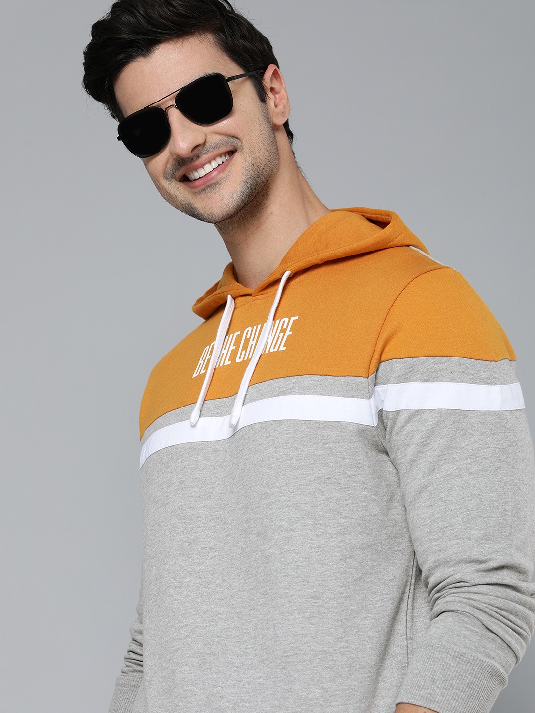 

HERE&NOW Men Mustard And Grey Colourblocked Hooded Pullover Sweatshirt