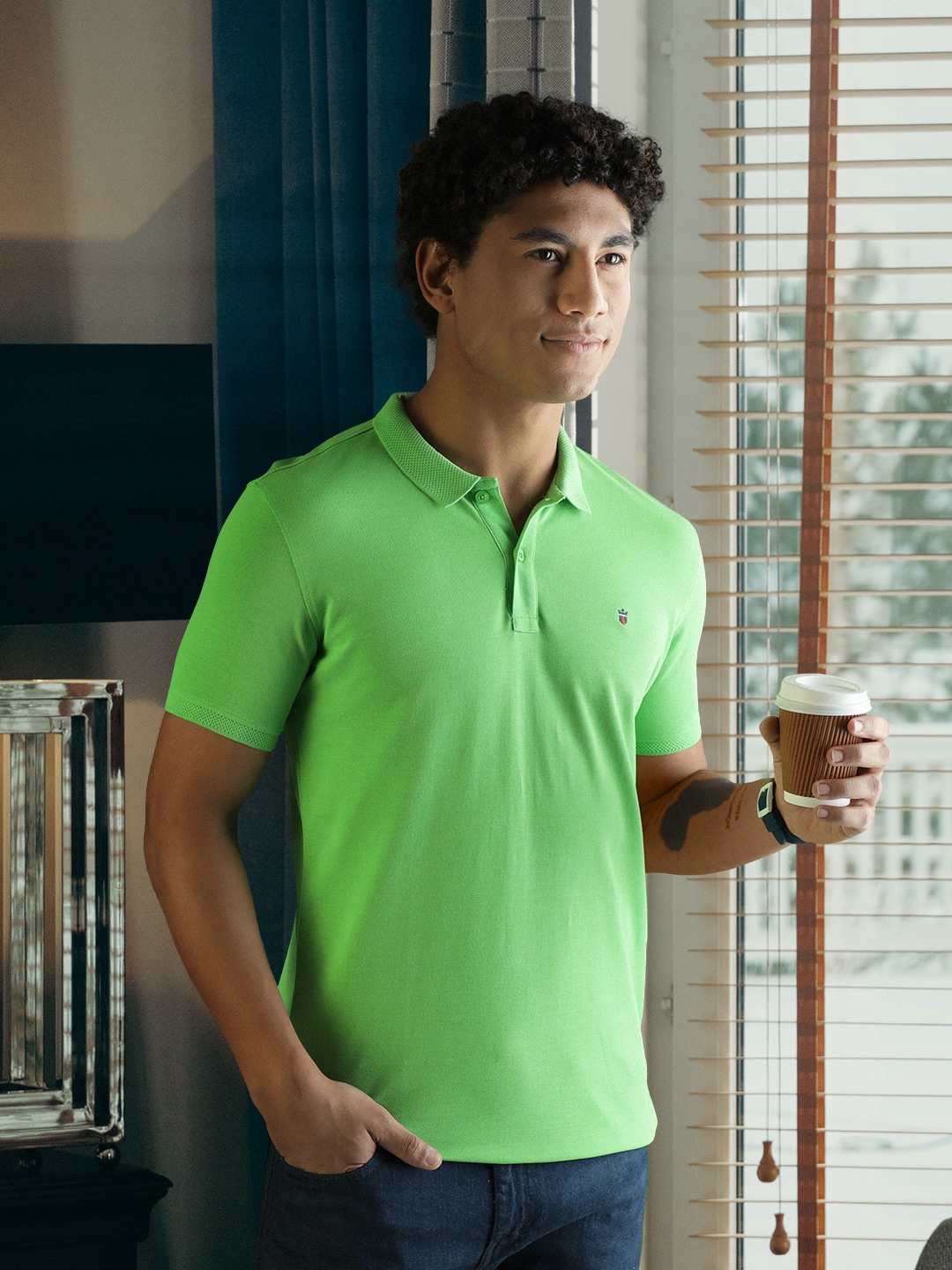 

Louis Philippe Sport Men Green Solid Polo Collar T-shirt