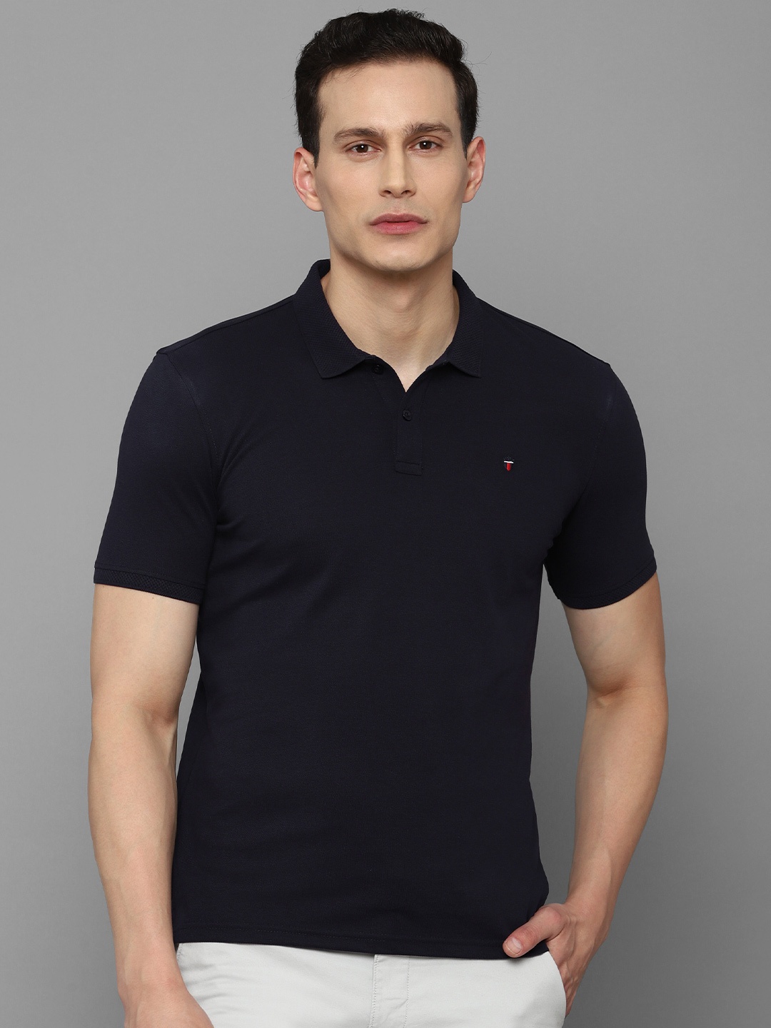 

Louis Philippe Sport Men Navy Blue Solid Polo Collar T-shirt