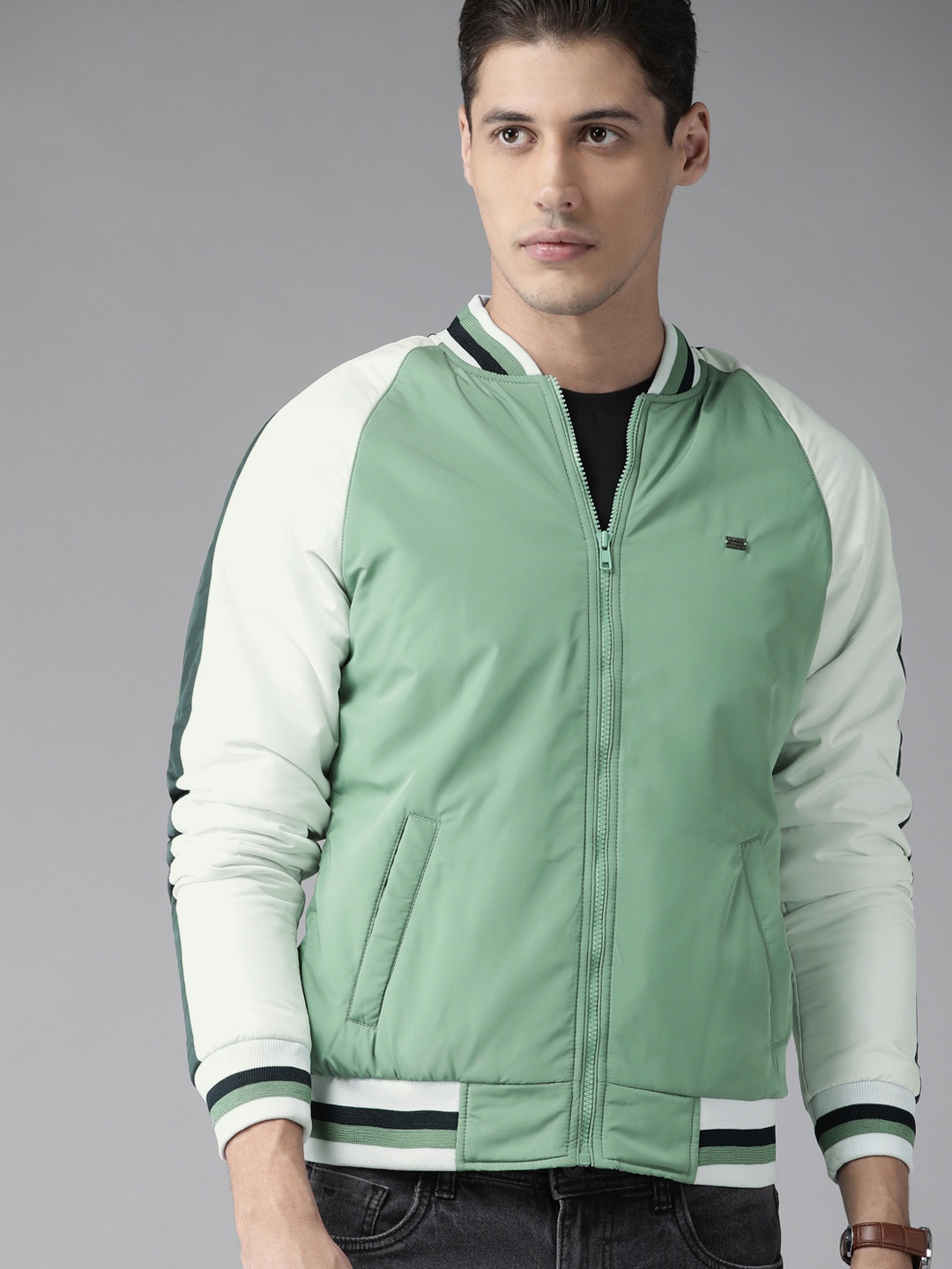 

Roadster Men Green & White Solid Bomber Jacket