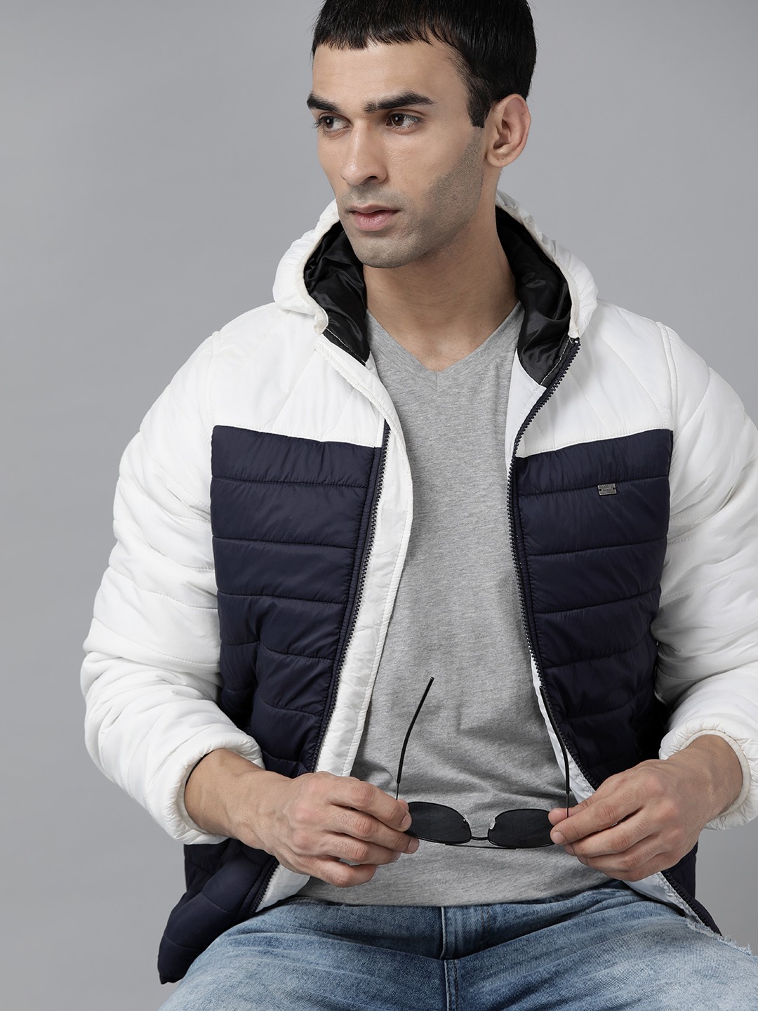 

Roadster Men White & Navy Blue Colourblocked Padded Jacket