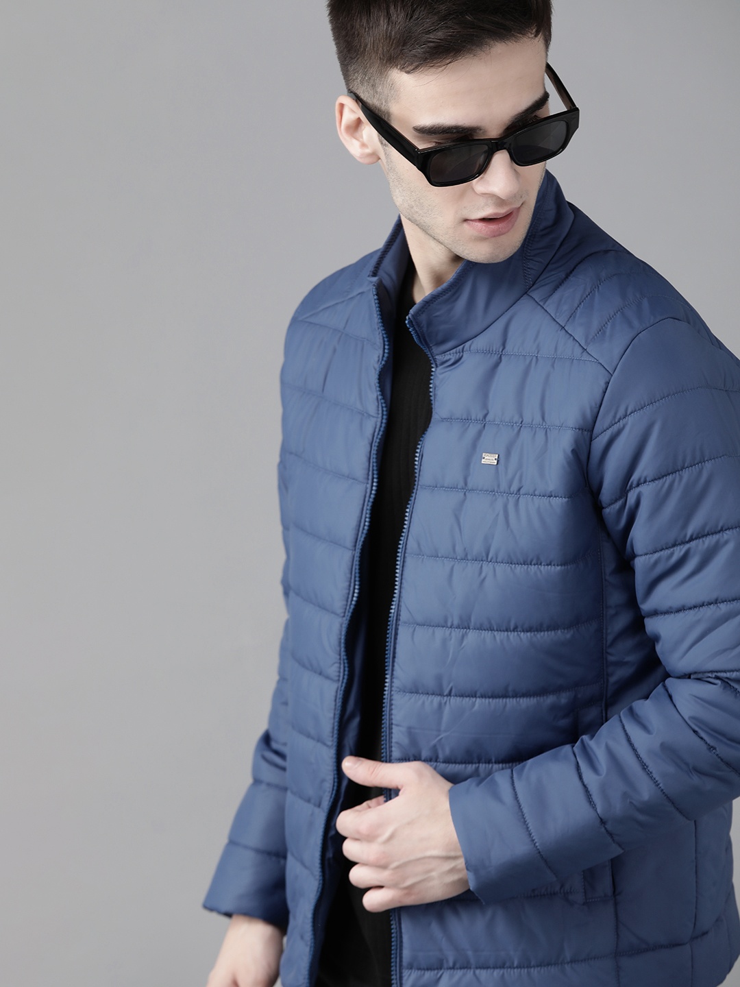 

Roadster Men Navy Blue Solid Padded Jacket