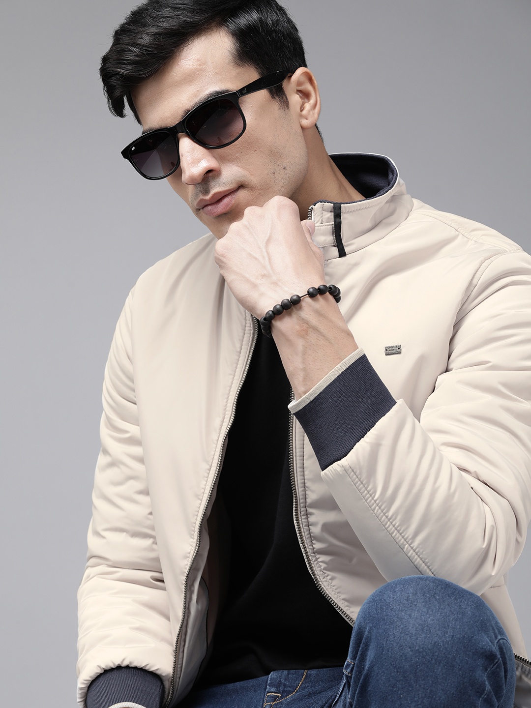 

Roadster Men Off White Solid Bomber Jacket