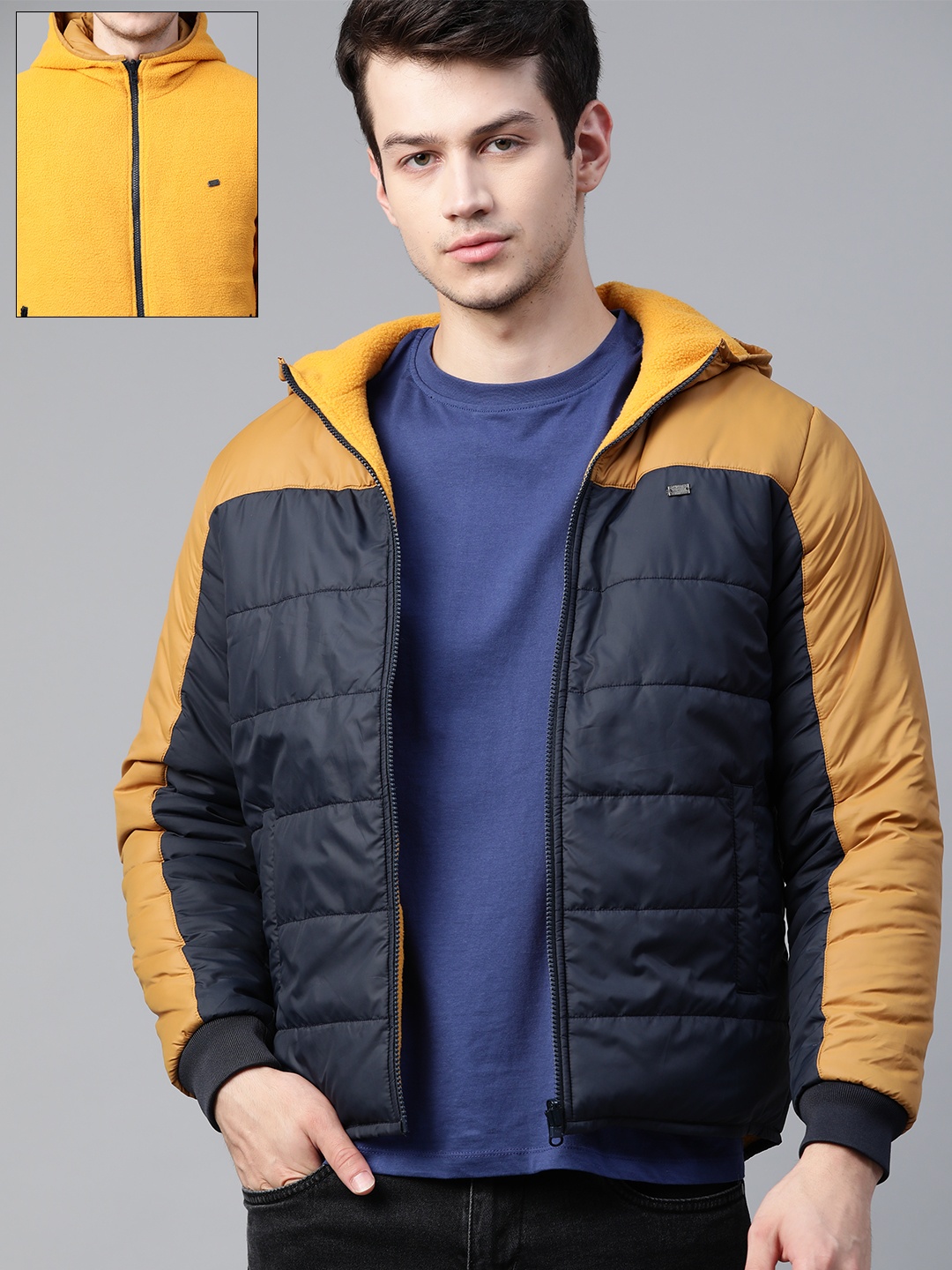 

Roadster Men Navy Blue & Mustard Yellow Colourblocked Reversible Padded Jacket