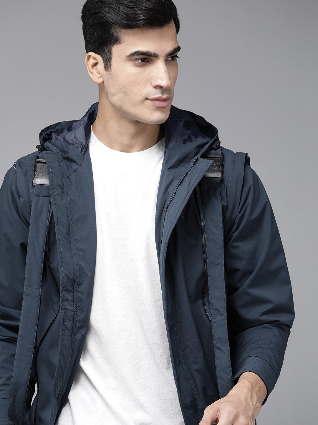 

Roadster Men Navy Blue Solid Hooded Convertible Tailored Jacket