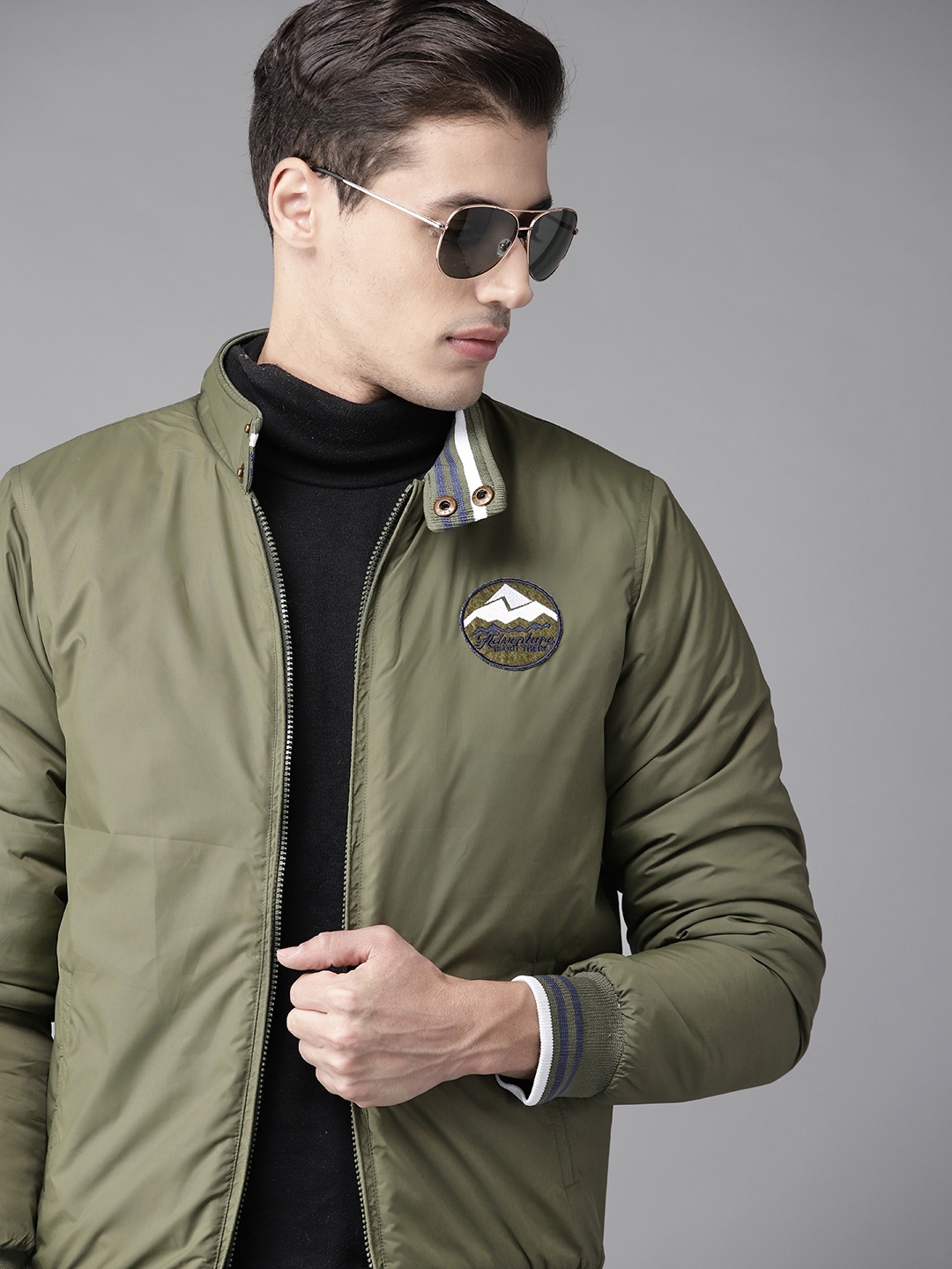 

Roadster Men Olive Green Solid Bomber Jacket