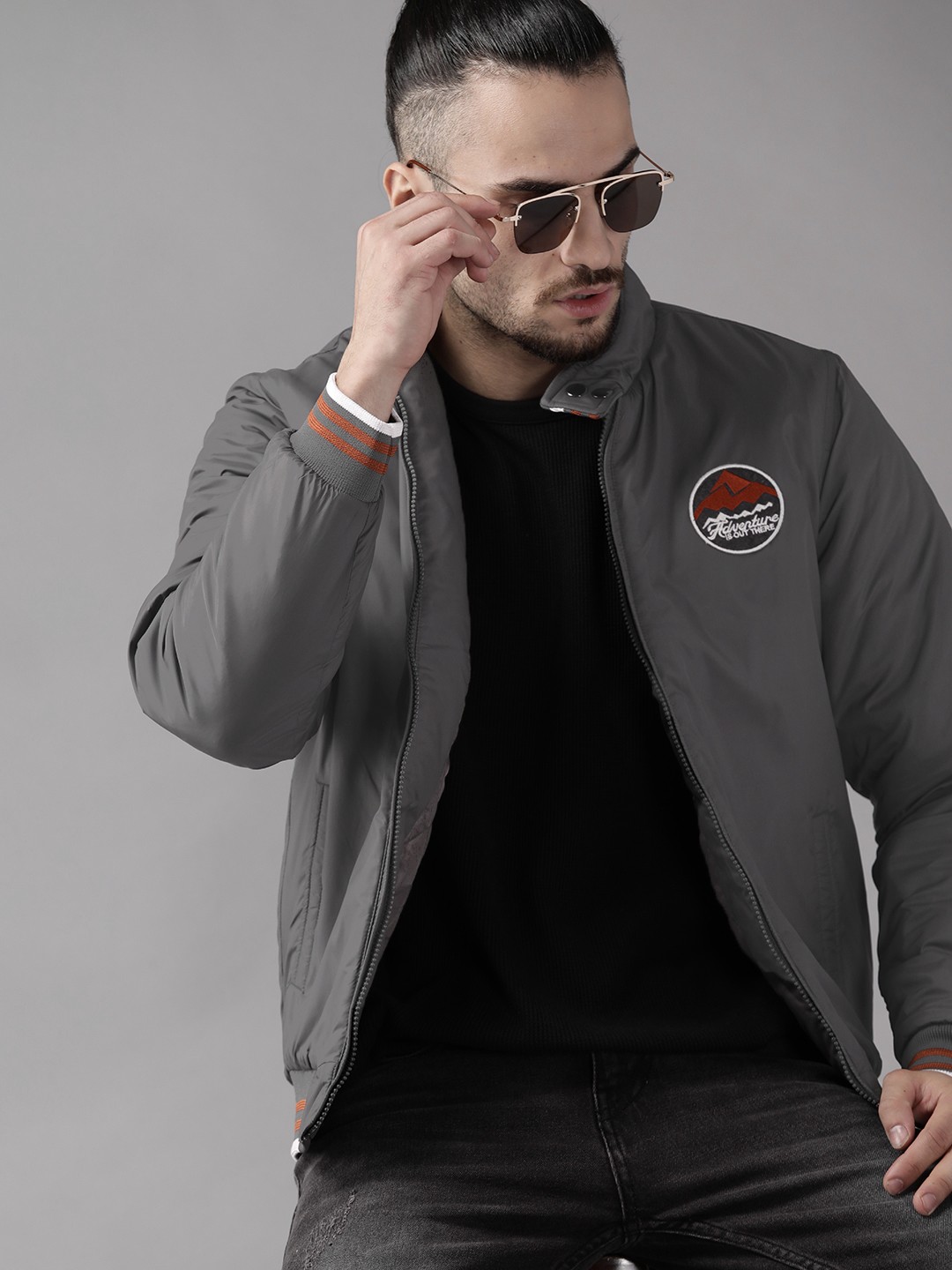 

Roadster Men Grey Solid Varsity Jacket With Patchwork