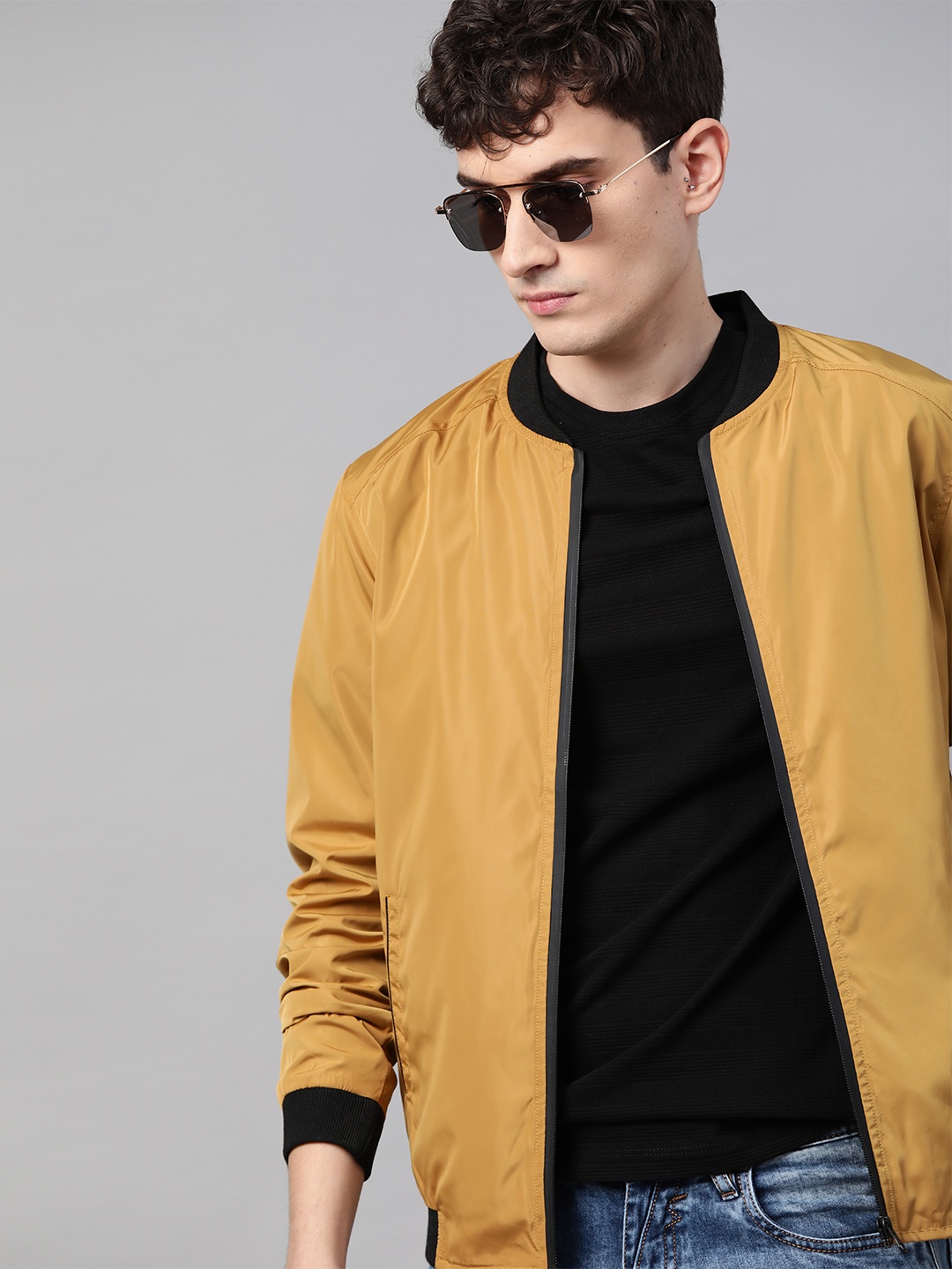 

Roadster Men Mustard Yellow Solid Bomber Jacket