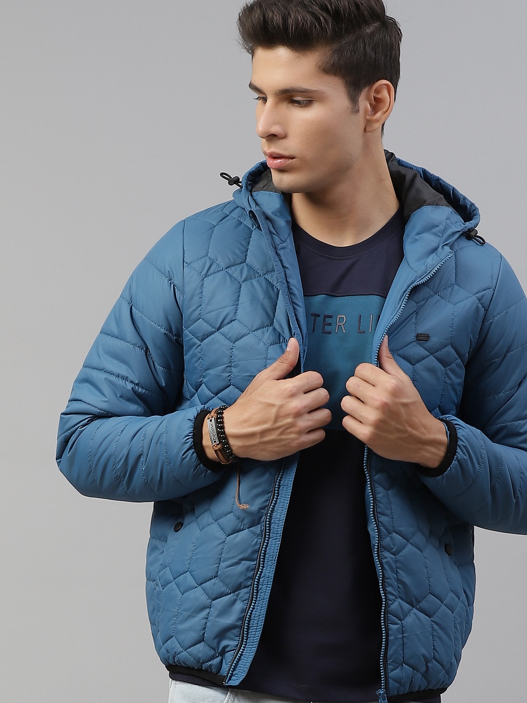 

Roadster Men Teal Blue Hooded Quilted Jacket
